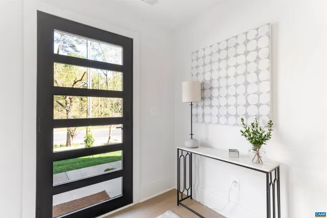 a view of entryway with a window and a potted plant