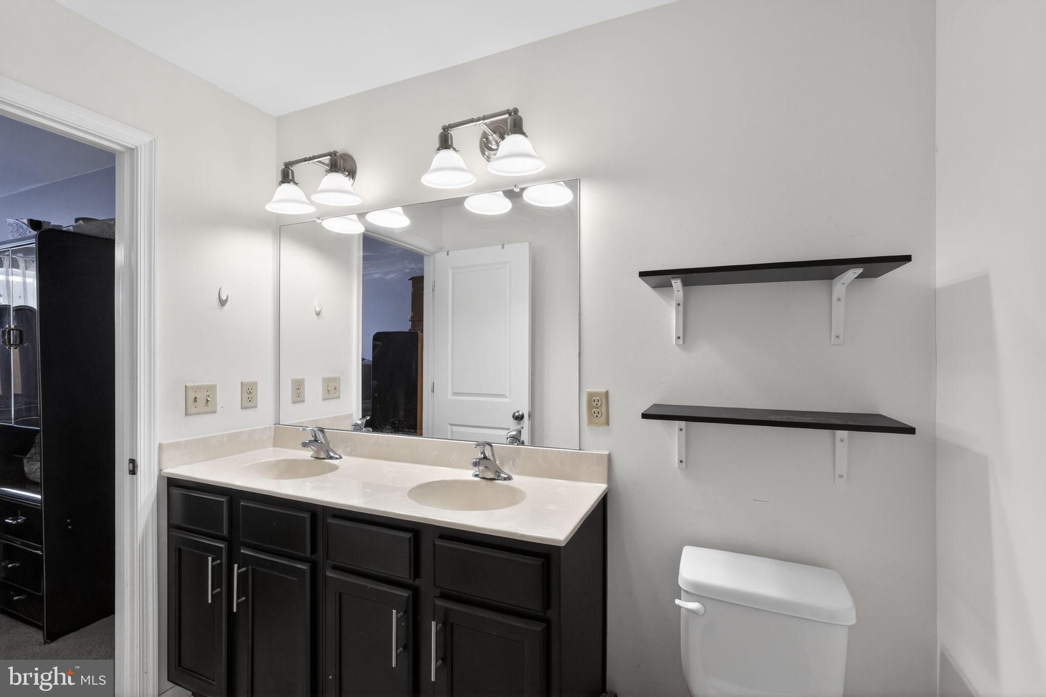 33 Rowand Way East Clementon, NJ 08021 - Photo 13 of 15 Sleek modern bathroom with dual sinks.