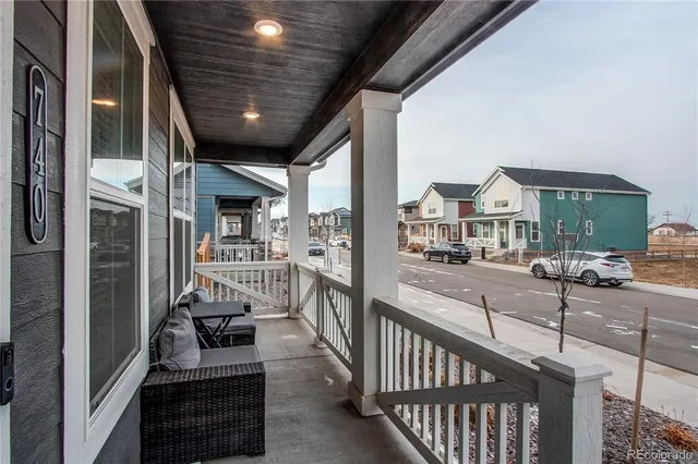 a view of a porch with furniture