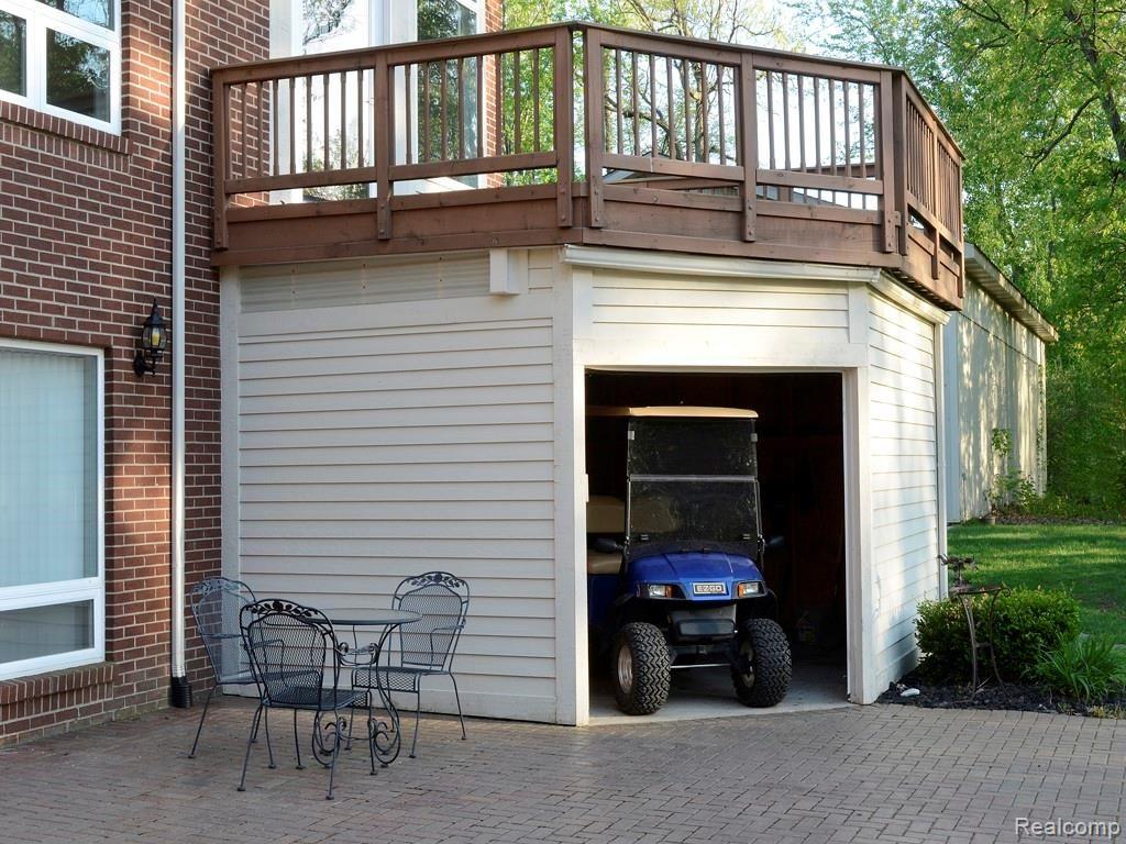 9247 Crockett Farm Road South Lyon, MI 48178 - Photo 41 of 50 41 deck shed.jpg