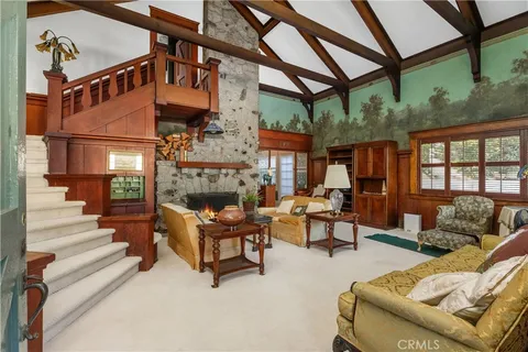 a outdoor space with patio furniture and a fireplace