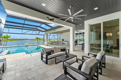 a outdoor living space with patio furniture and a potted plant