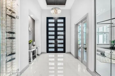 a view of entryway with livingroom and window