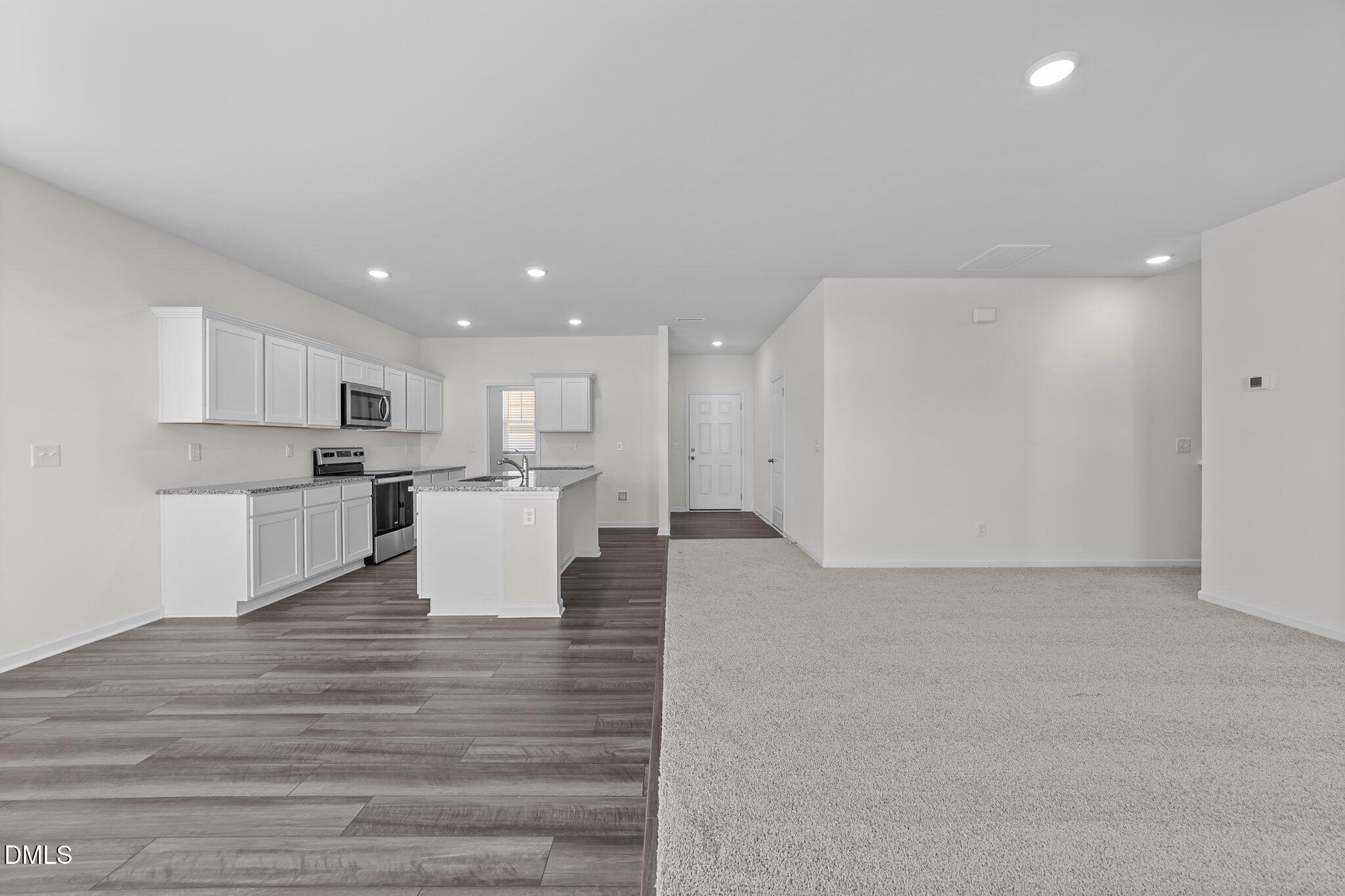 2577 Quarry Road Rolesville, NC 27571 - Photo 21 of 38 a view of kitchen with wooden floor