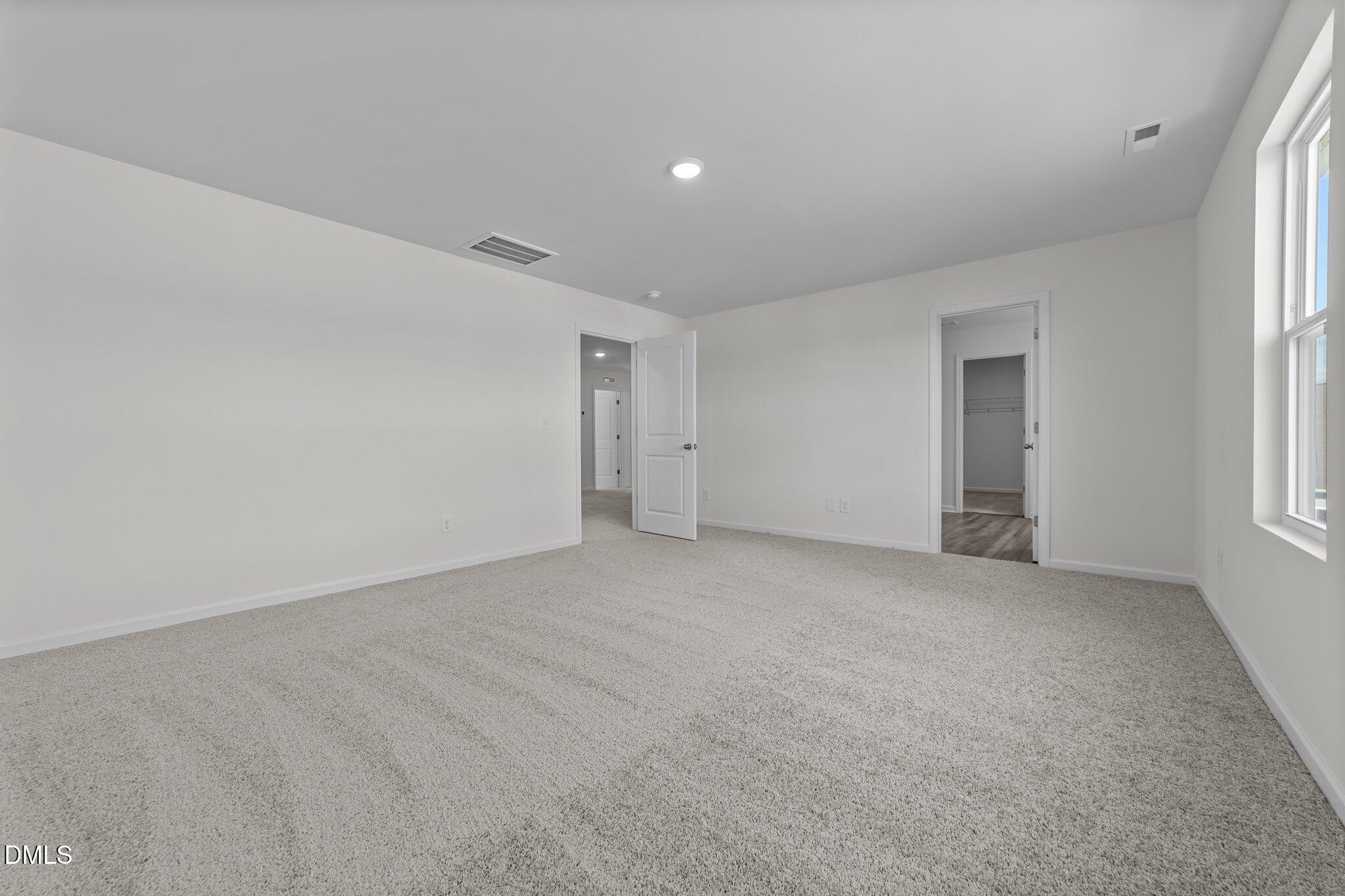 2577 Quarry Road Rolesville, NC 27571 - Photo 28 of 38 a view of an empty room with a window