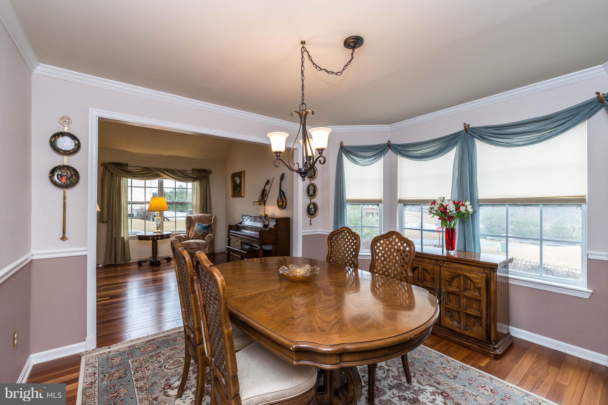 2805 Bachman Road Manchester, MD 21102 - Photo 11 of 30 Formal dining space has chair rail, big windows.