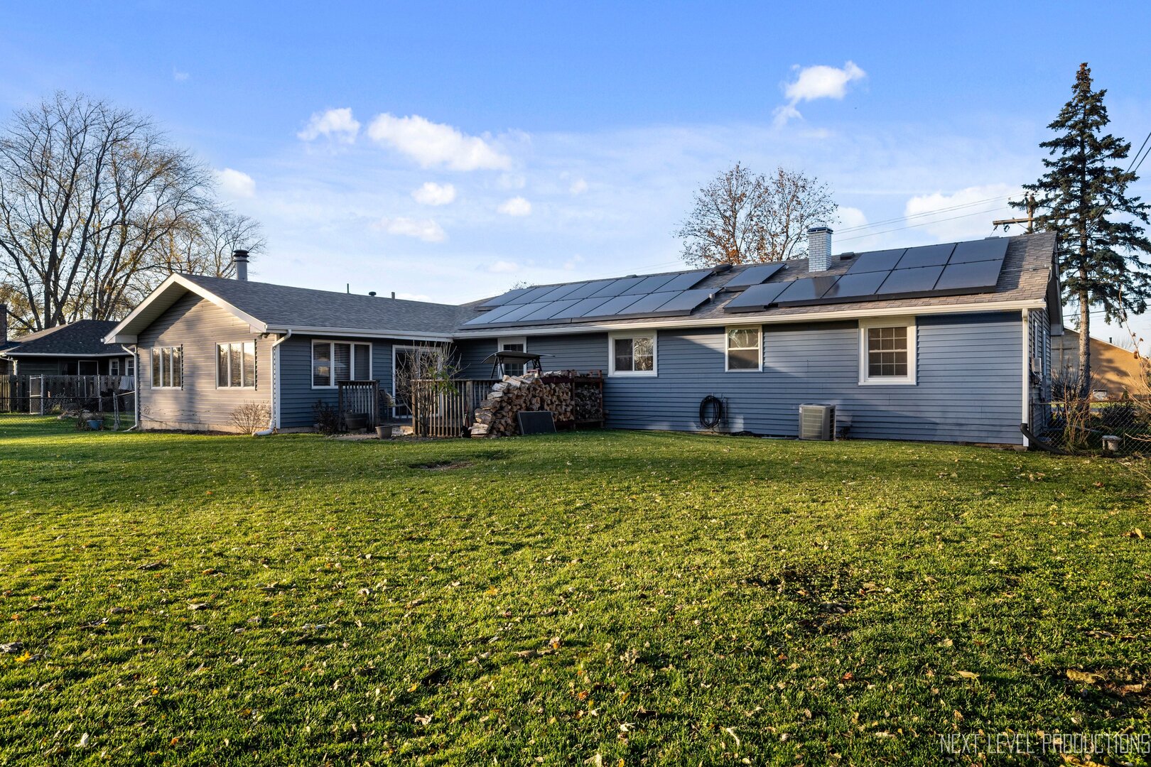 1685 Sheffer Road Aurora, IL 60505 - Photo 2 of 2 a front view of a house with garden