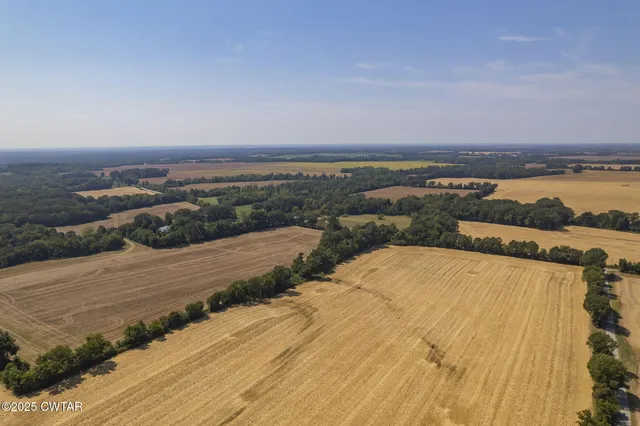 an aerial view of residential building and ocean