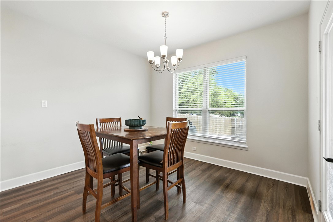 2862 Messenger Way Bryan, TX 77803 - Photo 7 of 22 a view of a dining room with furniture window and wooden floor