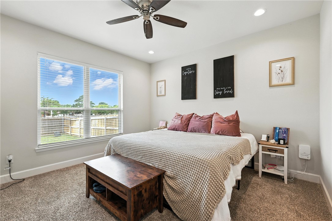 2862 Messenger Way Bryan, TX 77803 - Photo 8 of 22 a bedroom with a bed furniture and a window