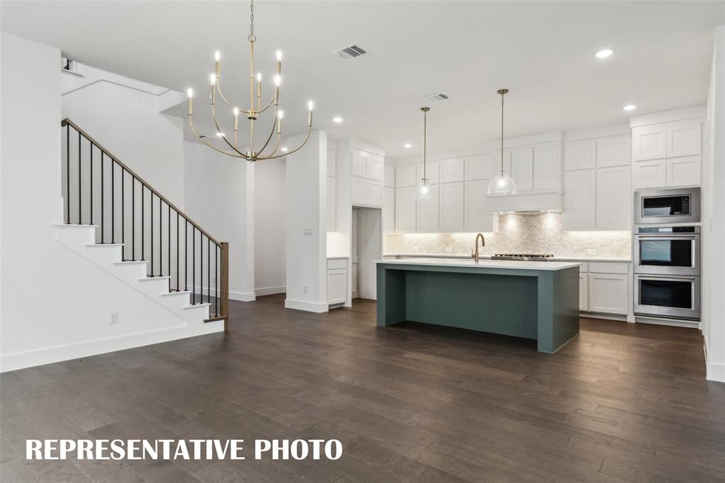3928 Launch Road McKinney, TX 75071 - Photo 5 of 15 Open and flowing, our Prescott III plan was designed for entertaining. REPRESENTATIVE PHOTO