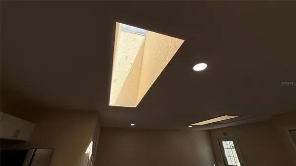 a bathroom with a sink a mirror and a shower