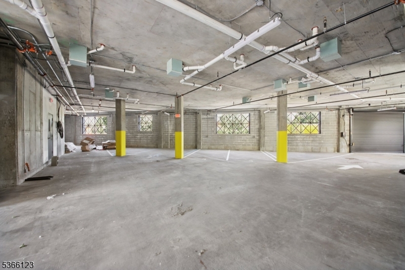 369 18th Avenue, Unit 304 Newark, NJ 07108 - Photo 18 of 18 a view of a room with gym equipment