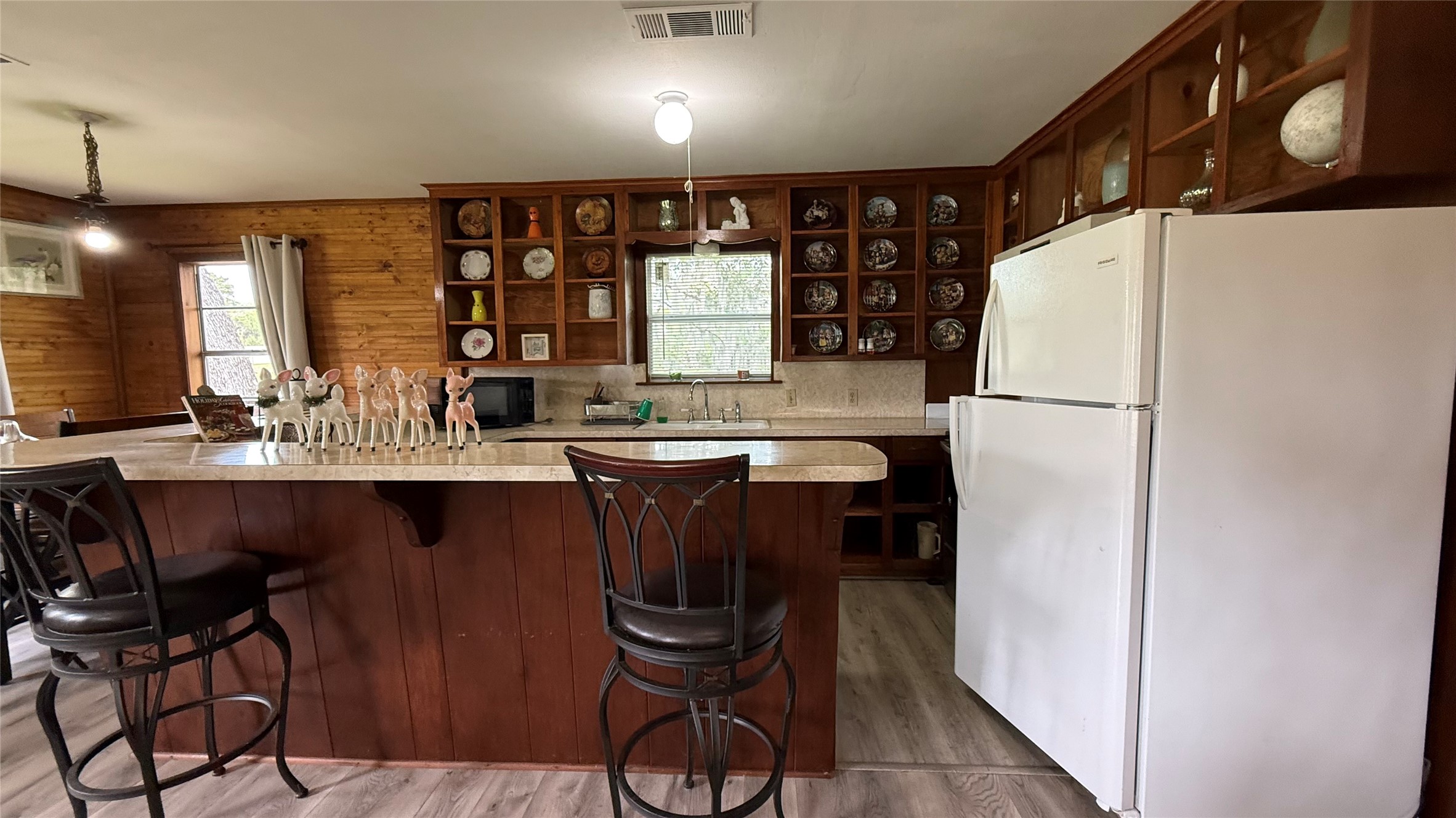 215 Weldon Livingston, TX 77351 - Photo 14 of 22 a kitchen with a refrigerator a sink and cabinets