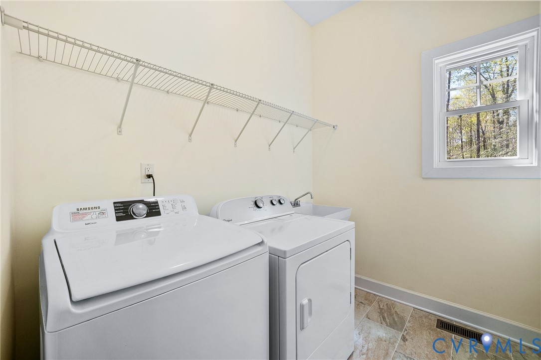 15430 River Road Chesterfield, VA 23838 - Photo 32 of 46 a utility room with dryer and washer