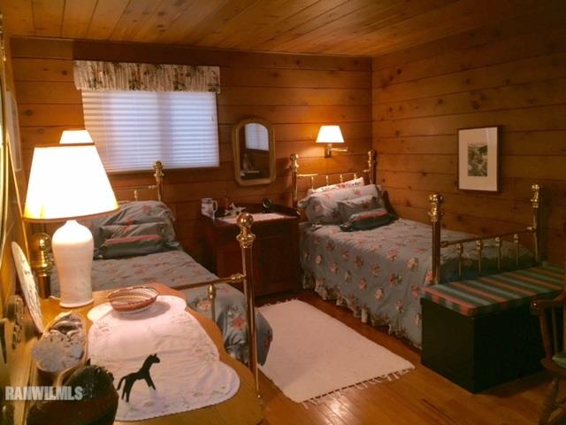 6495 West Blackjack Road Hanover, IL 61041 - Photo 16 of 21 a picture of living room with furniture and a fireplace