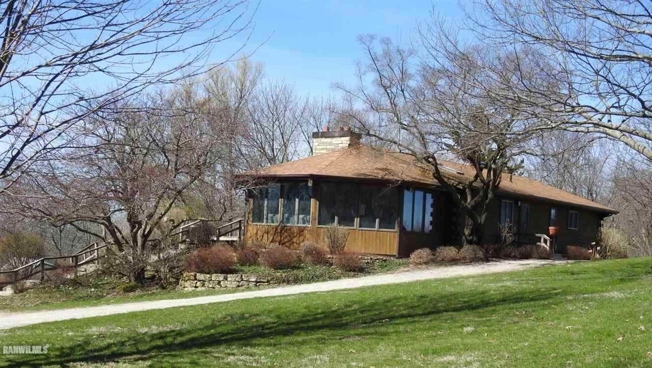 6495 West Blackjack Road Hanover, IL 61041 - Photo 2 of 21 a front view of house with yard and green space