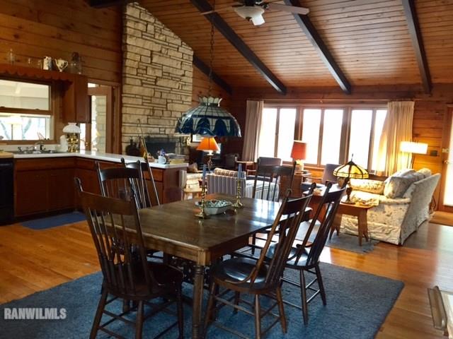 6495 West Blackjack Road Hanover, IL 61041 - Photo 4 of 21 a view of a dining room with furniture window and wooden floor