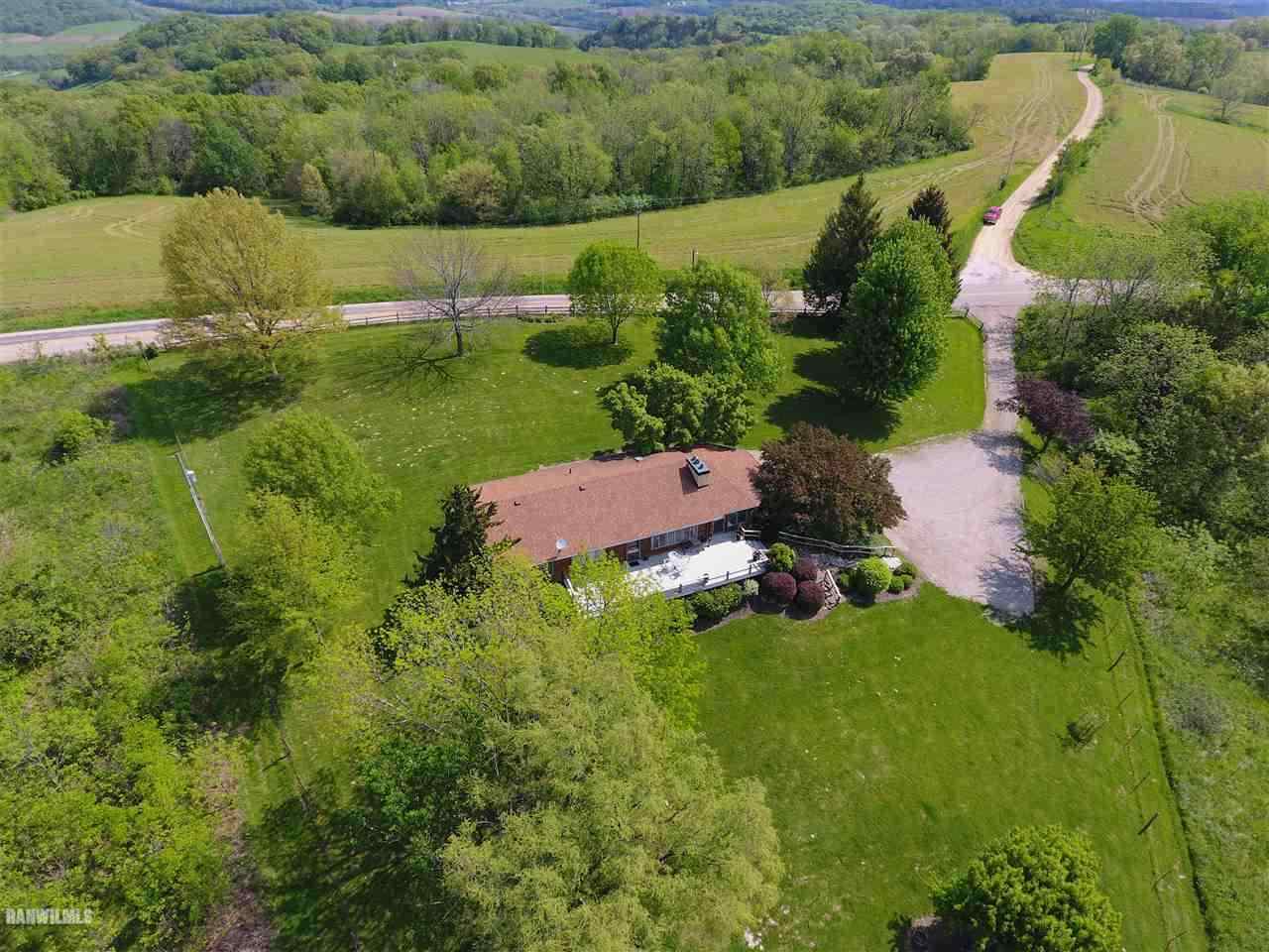 6495 West Blackjack Road Hanover, IL 61041 - Photo 7 of 21 an aerial view of a house with a yard