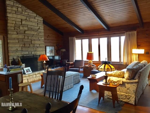 6495 West Blackjack Road Hanover, IL 61041 - Photo 10 of 21 a living room with furniture couches and a fireplace