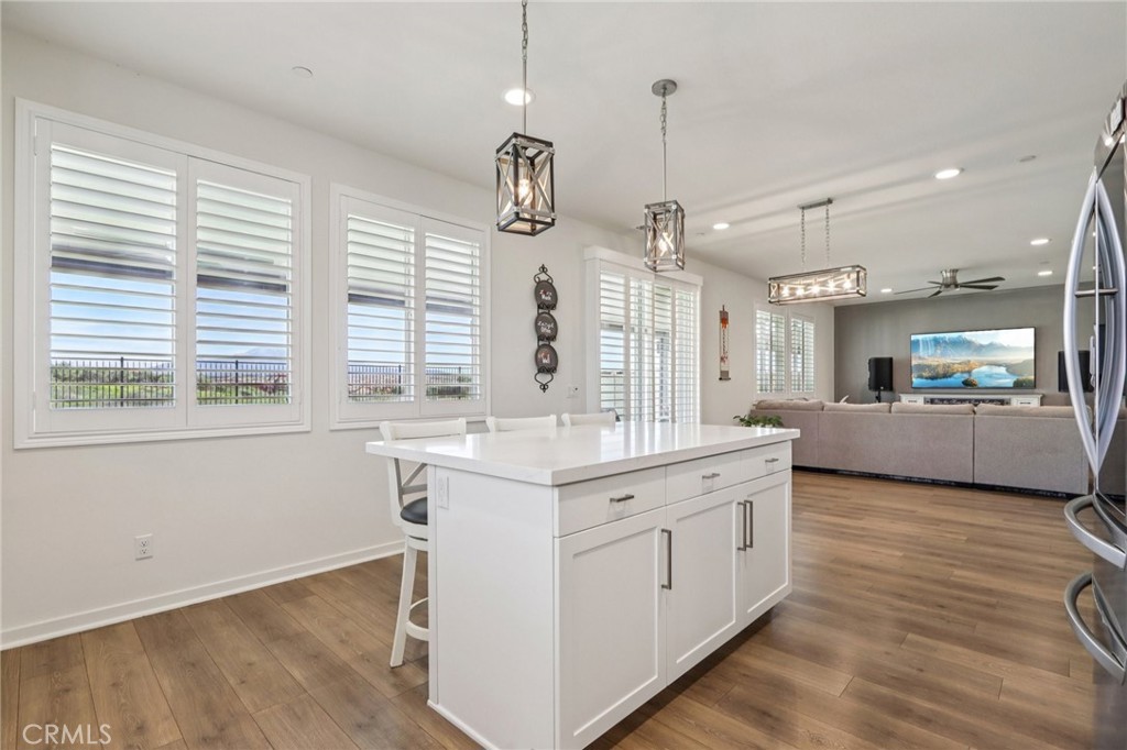 35293 Funk Way Beaumont, CA 92223 - Photo 17 of 70 a large white kitchen with a large window a sink and appliances
