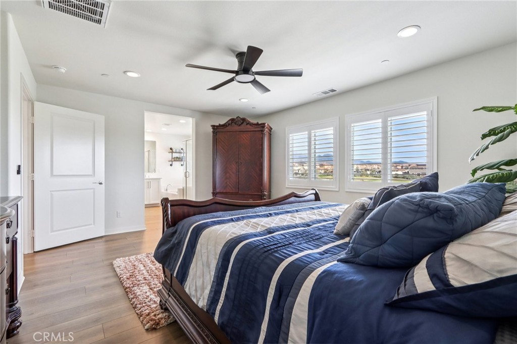 35293 Funk Way Beaumont, CA 92223 - Photo 29 of 70 a bedroom with a bed and a window