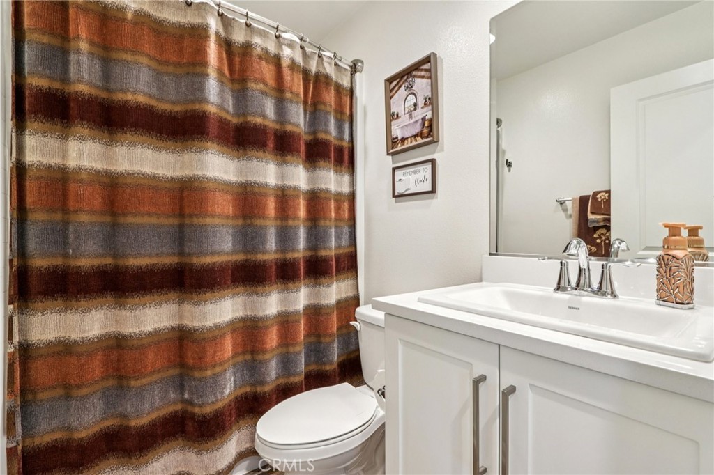 35293 Funk Way Beaumont, CA 92223 - Photo 36 of 70 a bathroom with a sink a toilet and shower