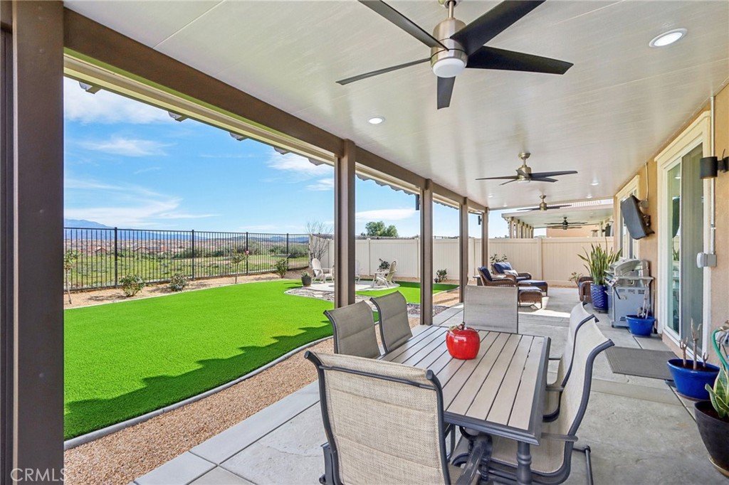 35293 Funk Way Beaumont, CA 92223 - Photo 41 of 70 a living room with patio furniture and a garden