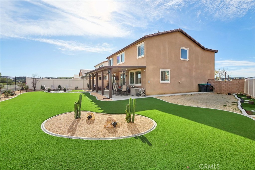 35293 Funk Way Beaumont, CA 92223 - Photo 49 of 70 a view of a house with a big yard and sitting area