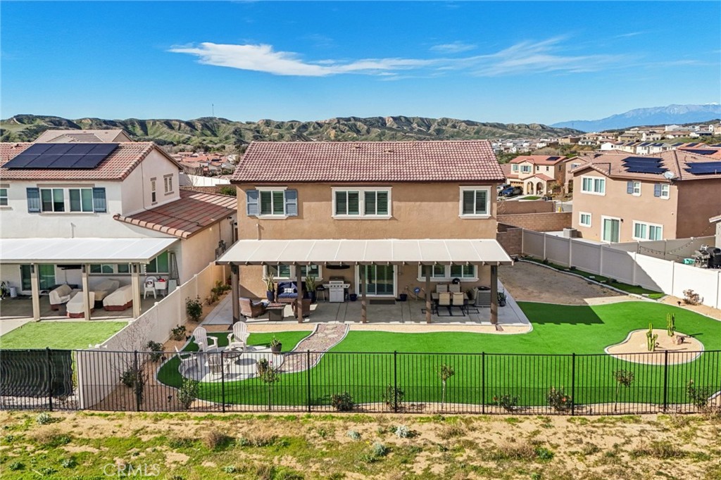 35293 Funk Way Beaumont, CA 92223 - Photo 52 of 70 a view of a white house with a big yard and large trees