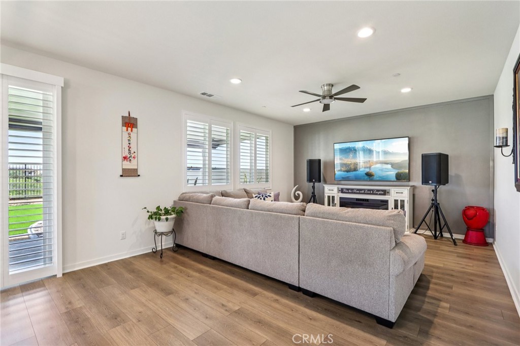 35293 Funk Way Beaumont, CA 92223 - Photo 9 of 70 a living room with furniture and a flat screen tv