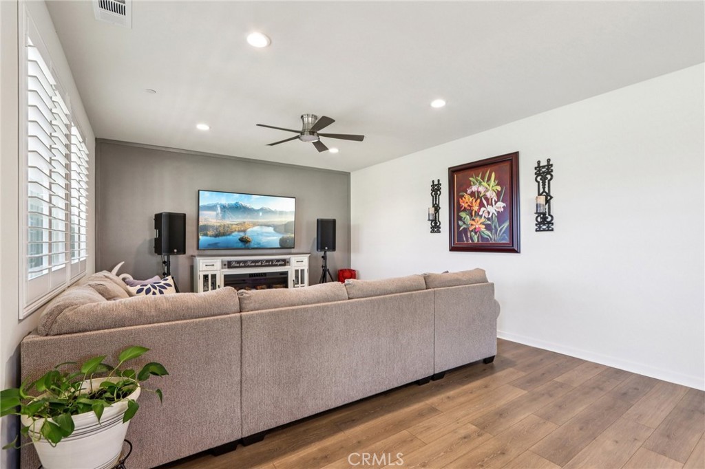 35293 Funk Way Beaumont, CA 92223 - Photo 10 of 70 a living room with furniture and a flat screen tv