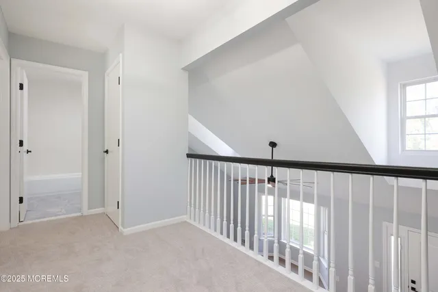 a view of hallway with stairs