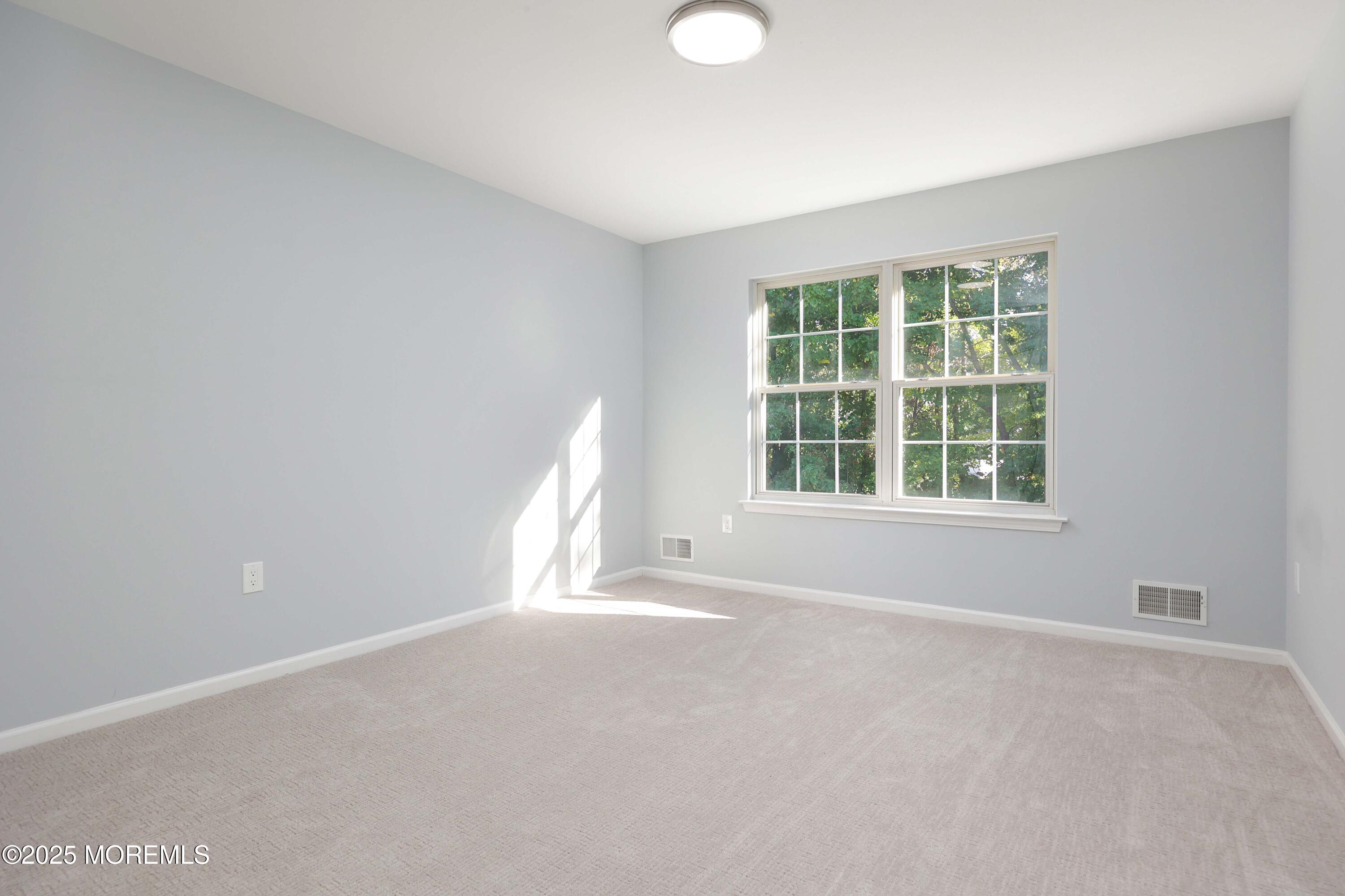 4 Ellison Court Union Beach, NJ 07735 - Photo 18 of 35 an empty room with a window