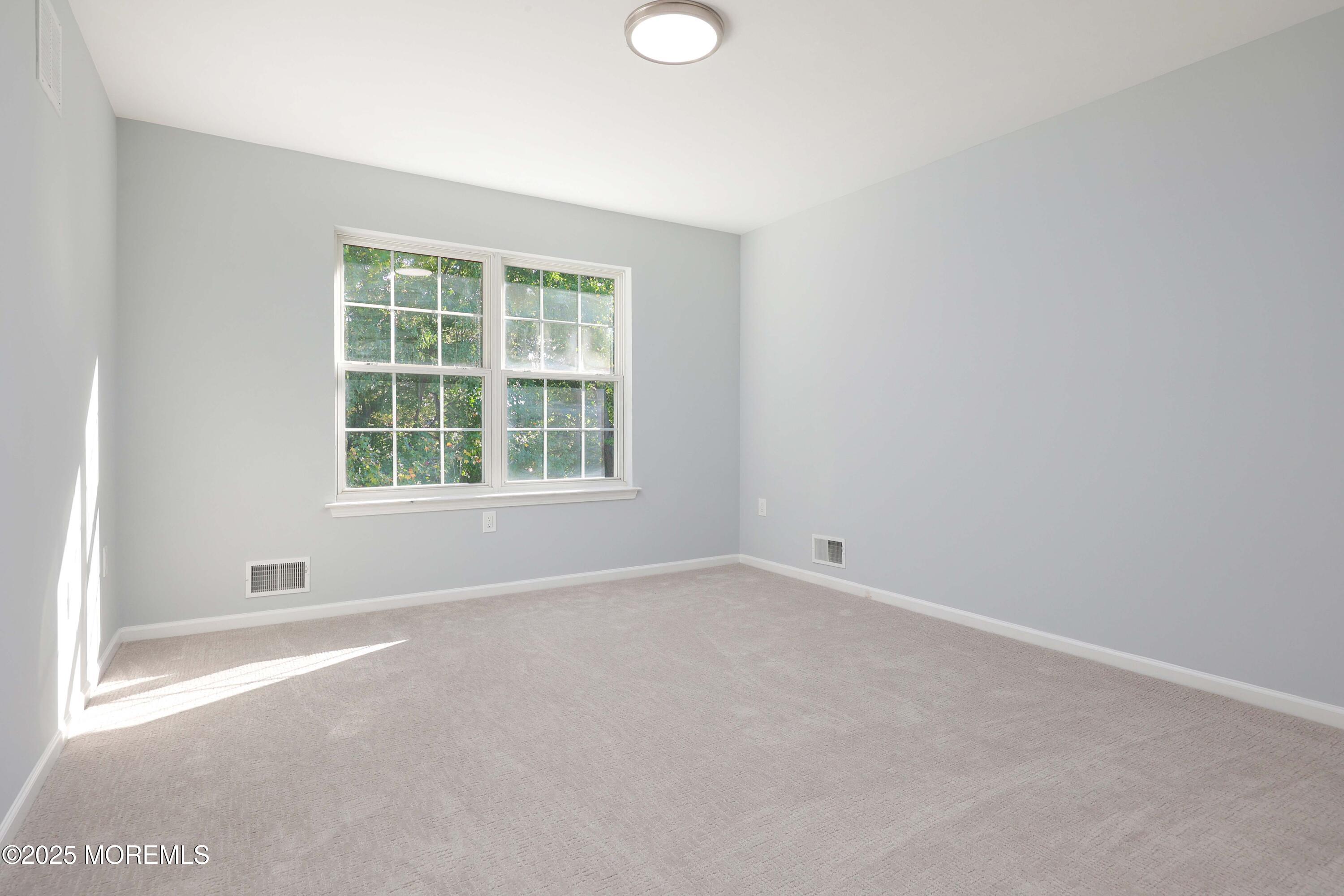 4 Ellison Court Union Beach, NJ 07735 - Photo 19 of 35 an empty room with a window