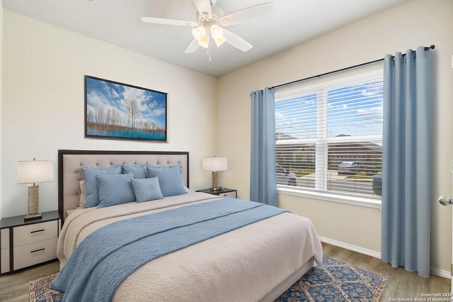 19916 Doc Holiday Drive Lytle, TX 78052 - Photo 18 of 27 a bedroom with a large bed and a window