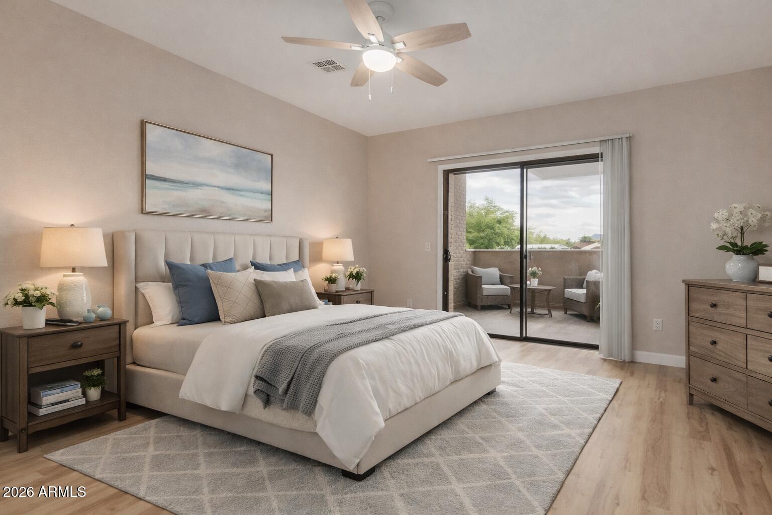 705 West Queen Creek Road, Unit 1208 Chandler, AZ 85248 - Photo 14 of 43 a bedroom with a large bed and a tv on dresser
