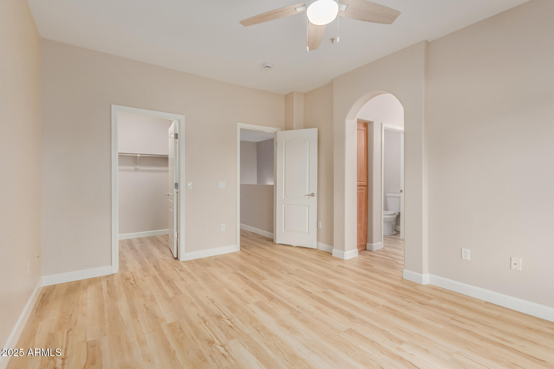 705 West Queen Creek Road, Unit 1208 Chandler, AZ 85248 - Photo 16 of 43 wooden floor in an empty room with a window