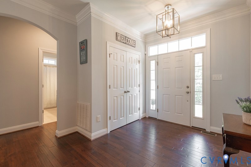 9425 Marie Road New Kent, VA 23124 - Photo 3 of 55 a view of a chandelier in a room and wooden floor