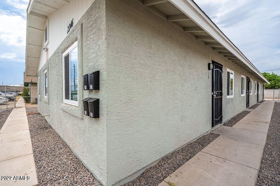 2246 West Southern Avenue, Unit 17 Phoenix, AZ 85041 - Photo 7 of 7 a hallway with seating area