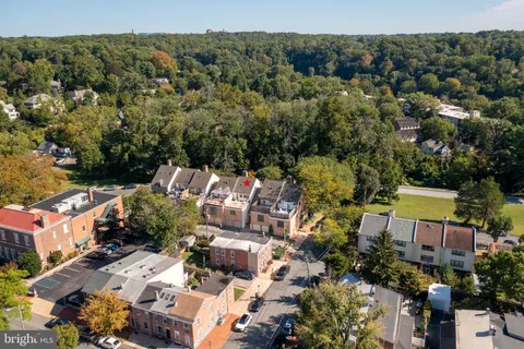 an aerial view of a house with a garden