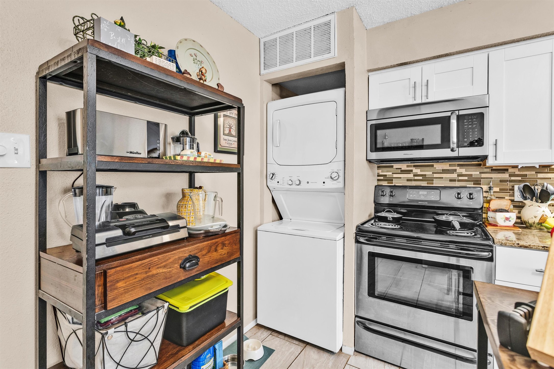 12900 Walden Road, Unit 814H Montgomery, TX 77356 - Photo 14 of 42 Washer & Dryer stay with the condo