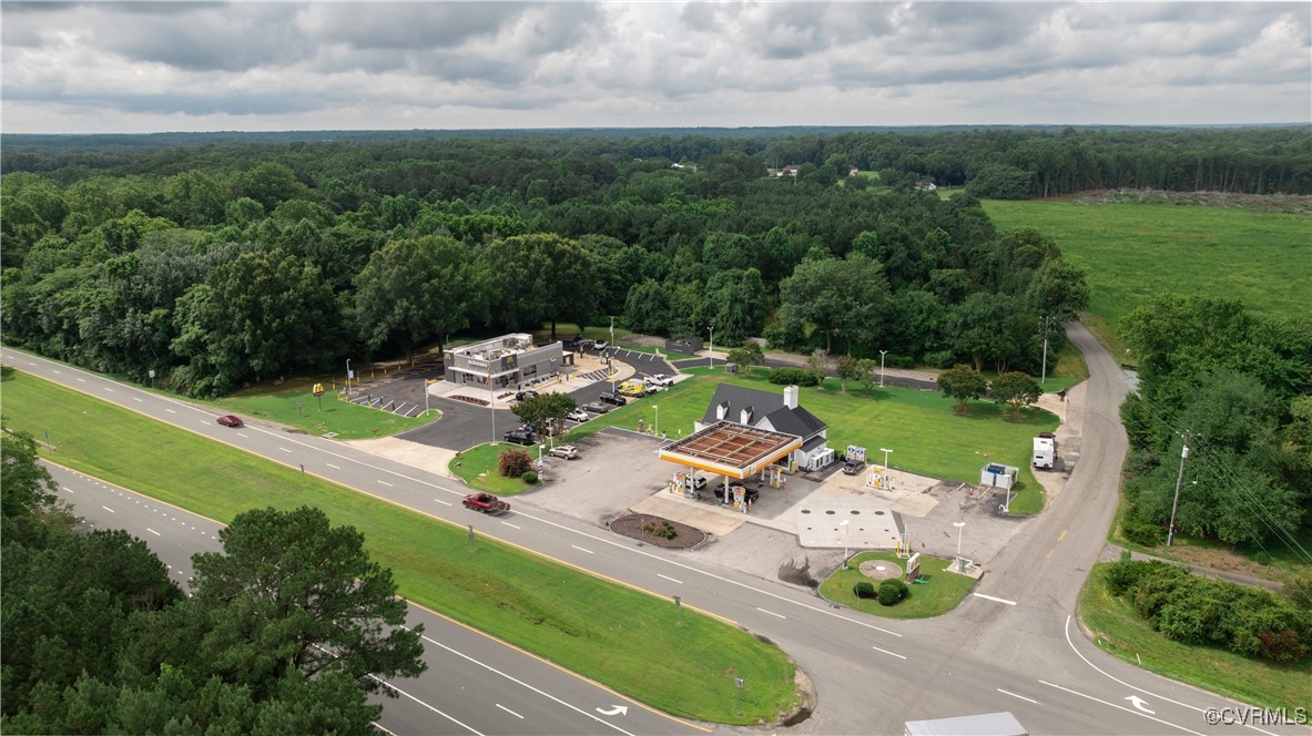 9131 Barhamsville Road Toano, VA 23168 - Photo 30 of 39 an aerial view of a house with outdoor space