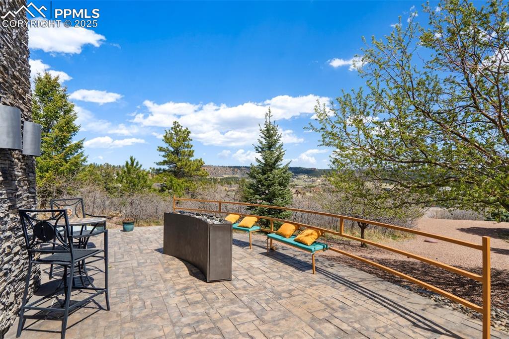18496 Pixie Park Road Monument, CO 80132 - Photo 41 of 50 a view of a terrace with chairs