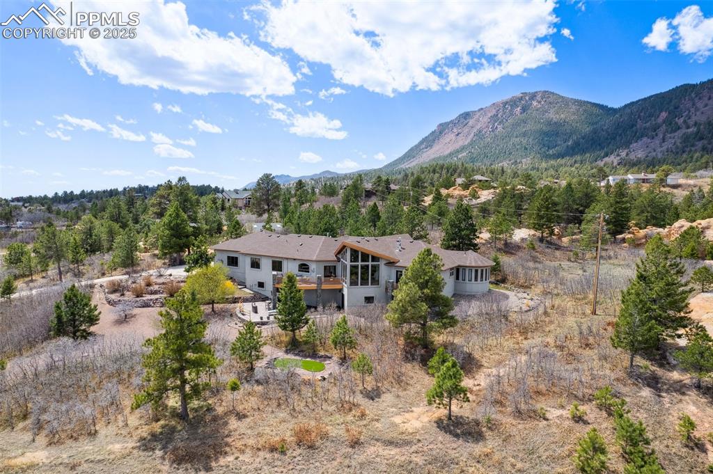 18496 Pixie Park Road Monument, CO 80132 - Photo 48 of 50 a view of a city with a mountain