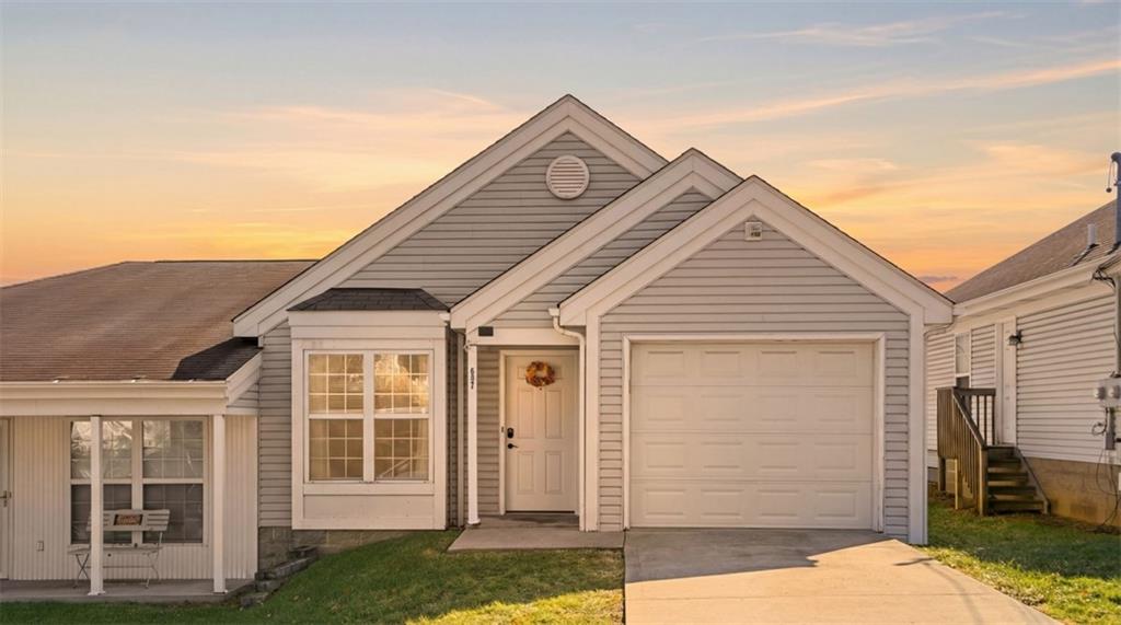 607 Locust Street Coraopolis, PA 15108 - Photo 1 of 18 a front view of a house with a yard