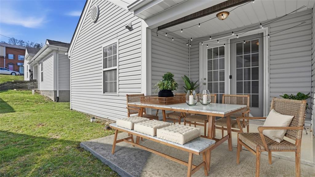 607 Locust Street Coraopolis, PA 15108 - Photo 15 of 18 a view of a house with backyard and sitting area