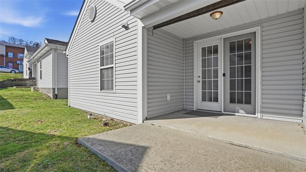 607 Locust Street Coraopolis, PA 15108 - Photo 16 of 18 a front view of a house with a yard