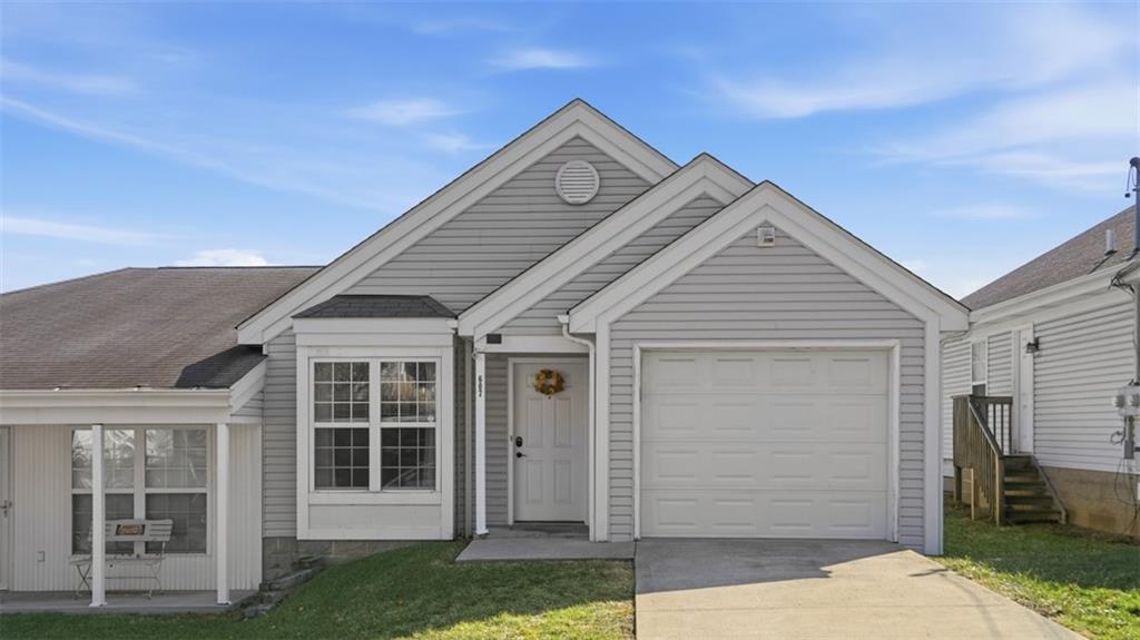 607 Locust Street Coraopolis, PA 15108 - Photo 17 of 18 a front view of a house with a yard