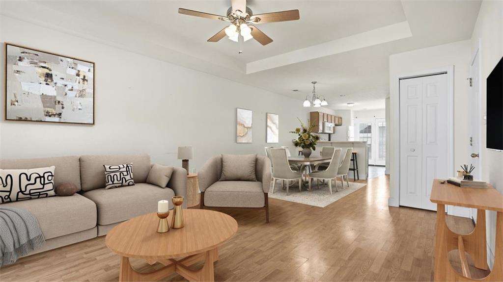 607 Locust Street Coraopolis, PA 15108 - Photo 2 of 18 a living room with furniture and wooden floor